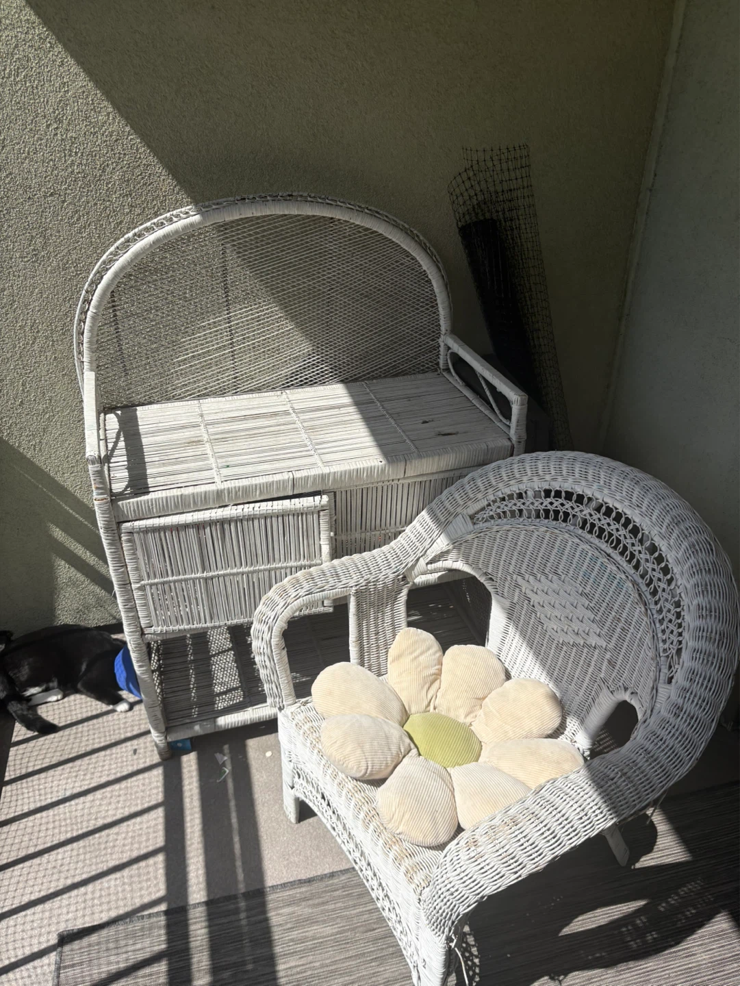 White Wicker Armchair with Flower Cushion