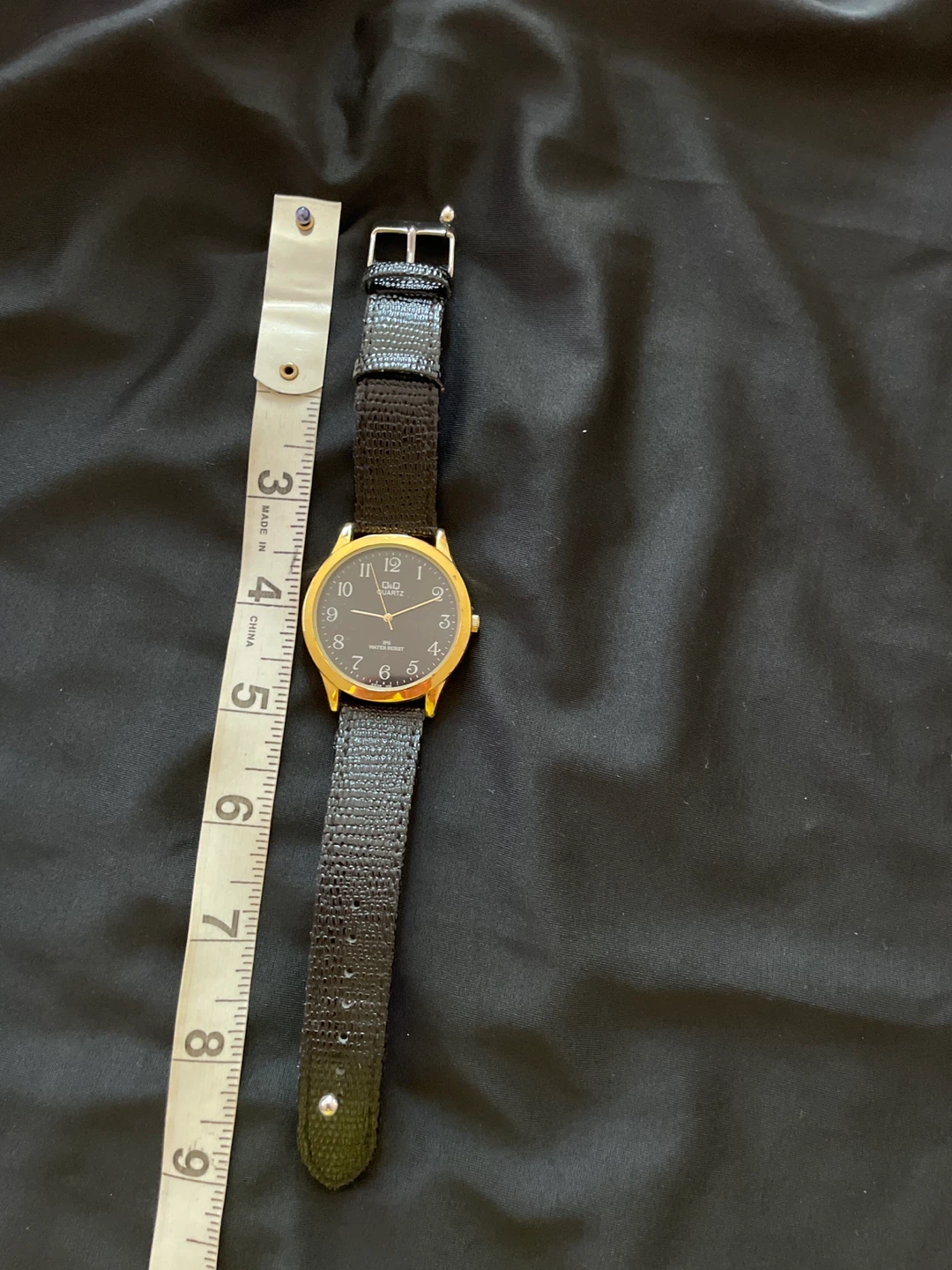 Q&Q Quartz Gold-Tone Black Dial Watch