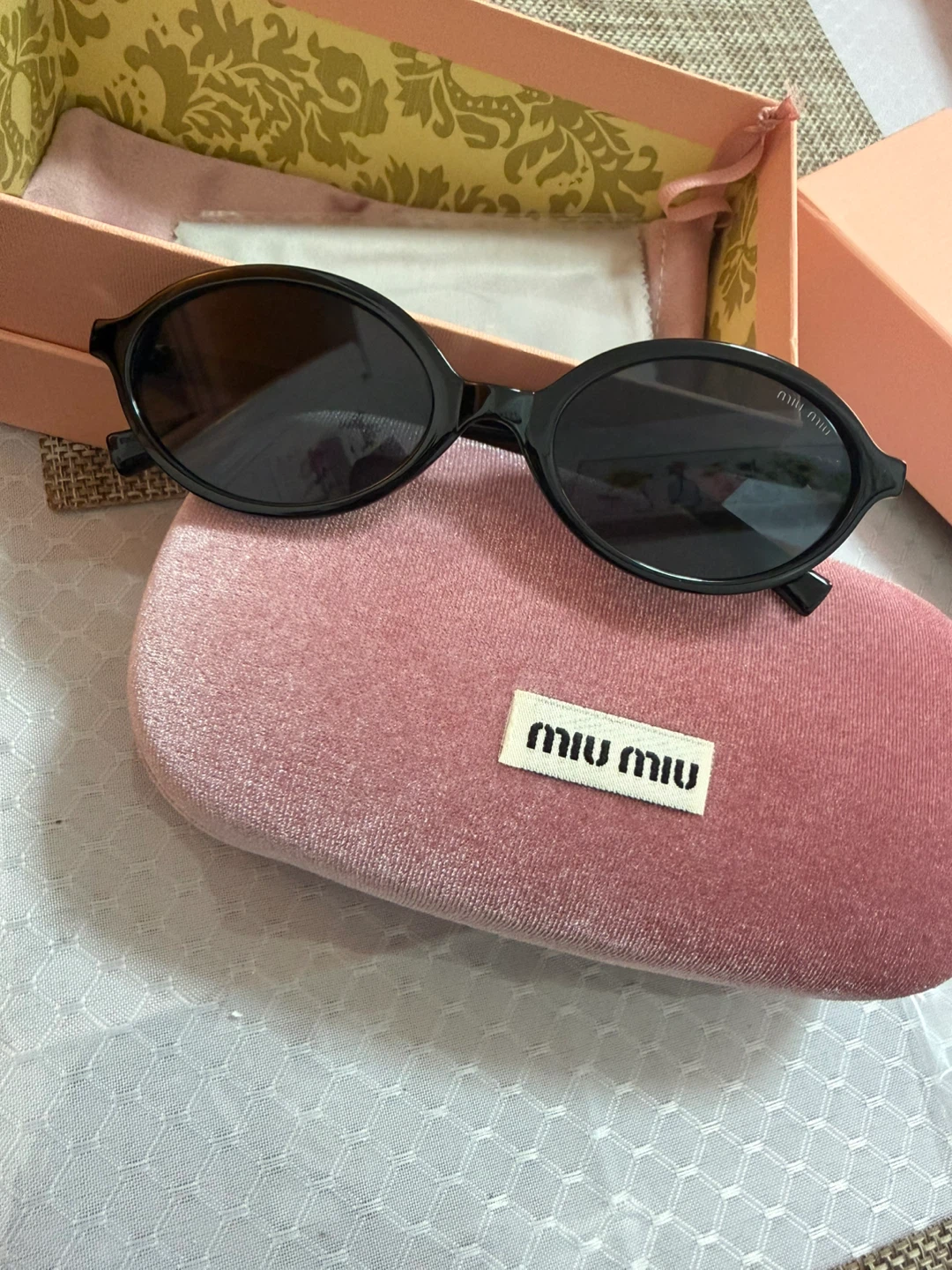 Miu Miu Black Oval Sunglasses with Pink Velvet Case