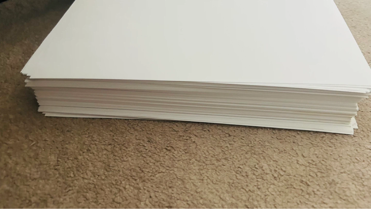 Stack of White Paper - photo 2