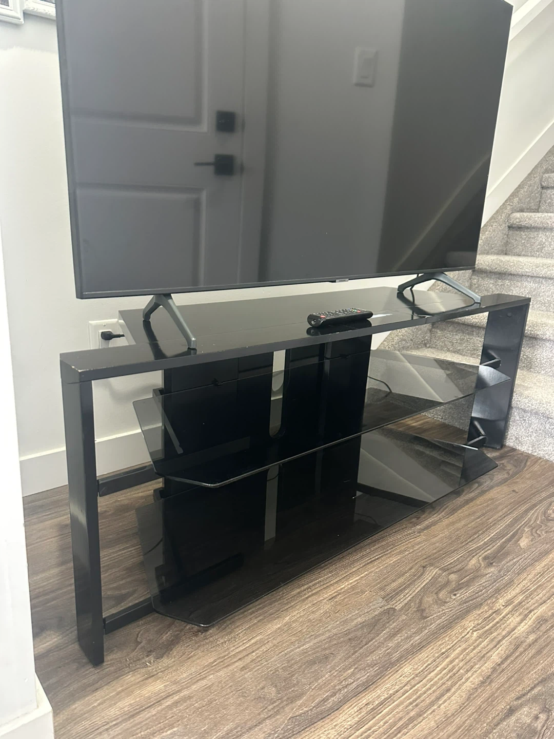Modern Black TV Stand with Glass Shelves – Sleek & Stylish