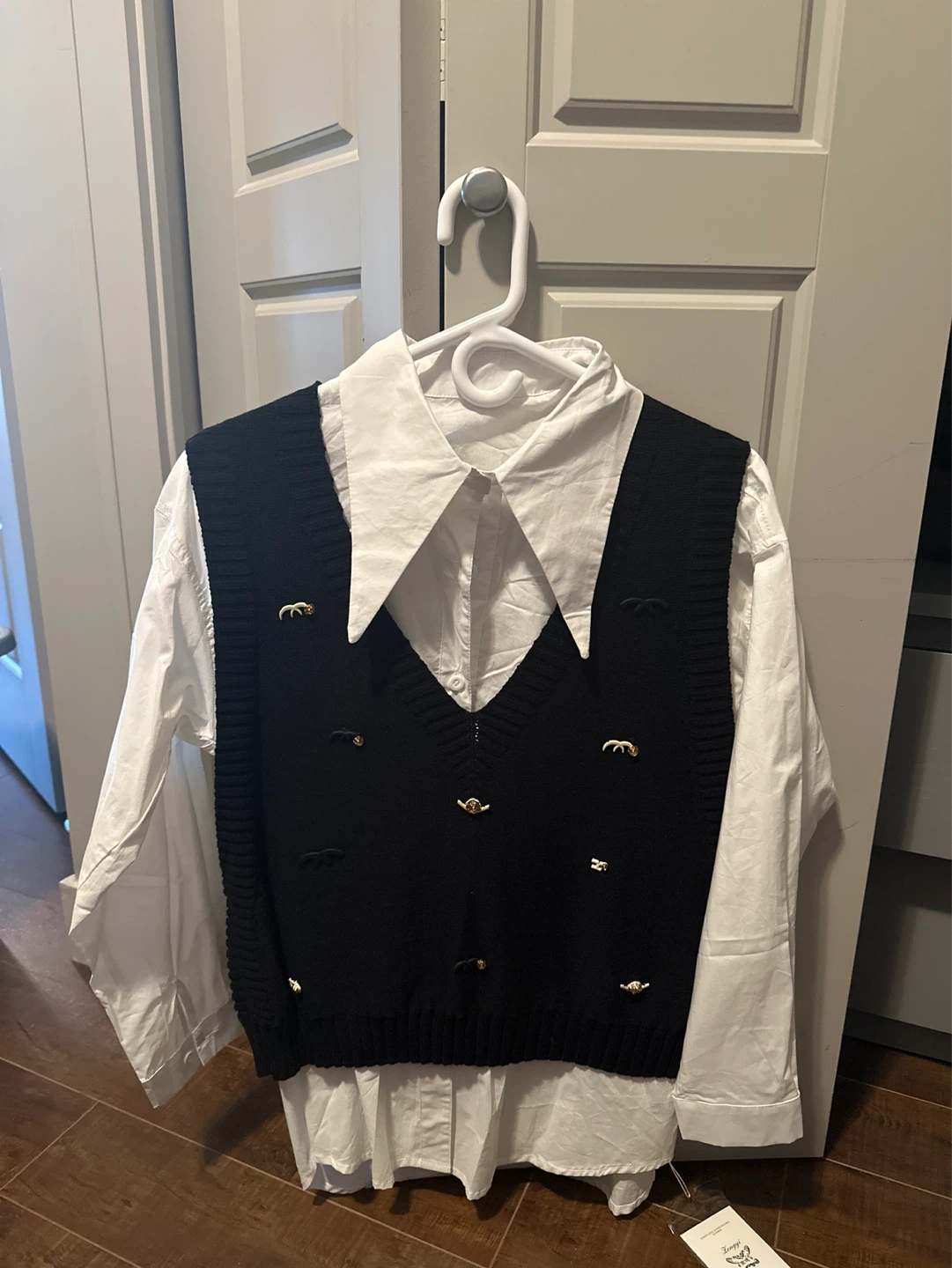 Women's White Button-Up Shirt with Black V-Neck Sweater Vest