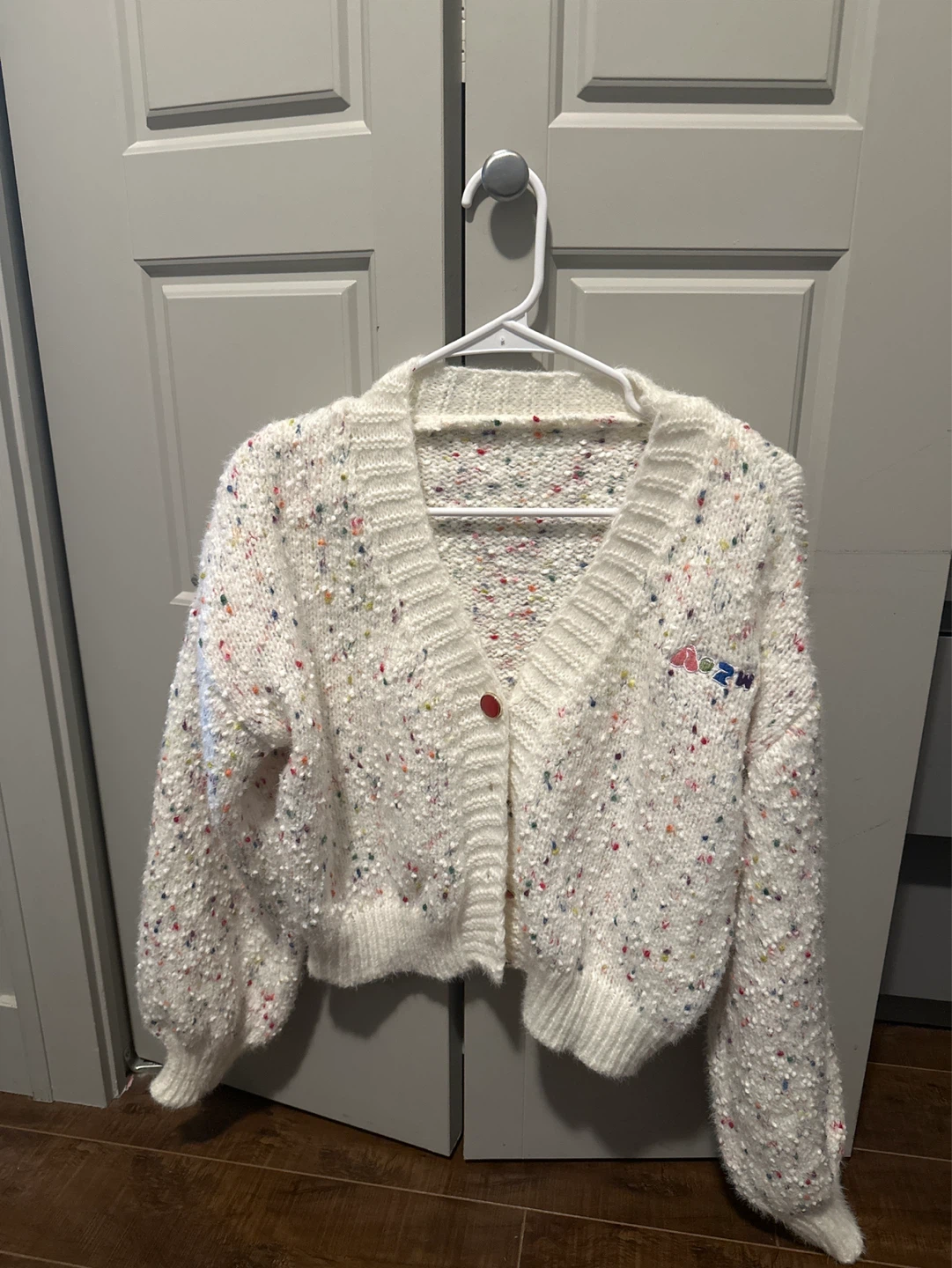 White Speckled Cardigan with Rainbow Detail