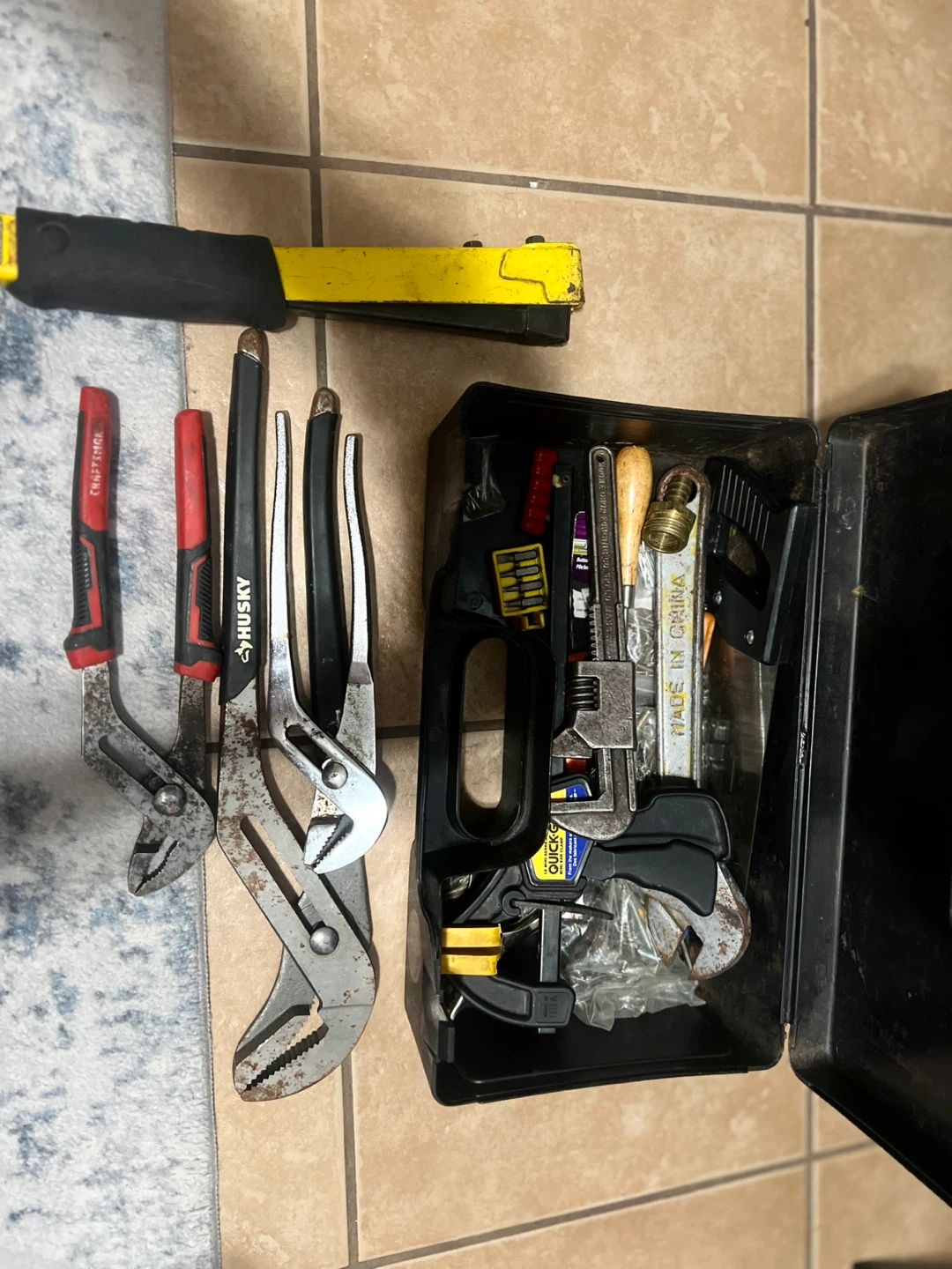 Tool Set with Pliers, Wrenches, and Clamp