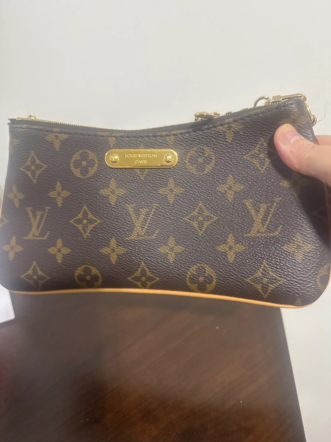 Louis Vuitton Pochette Liv Monogram Canvas