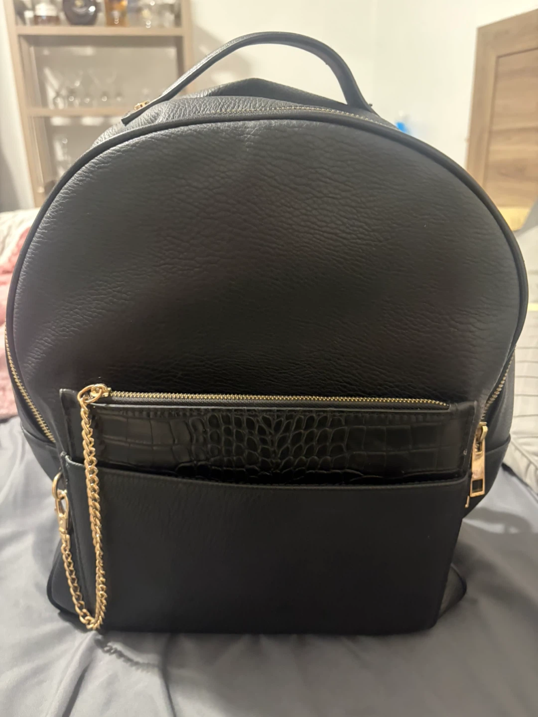 Black Faux Leather Backpack with Gold Chain Detail