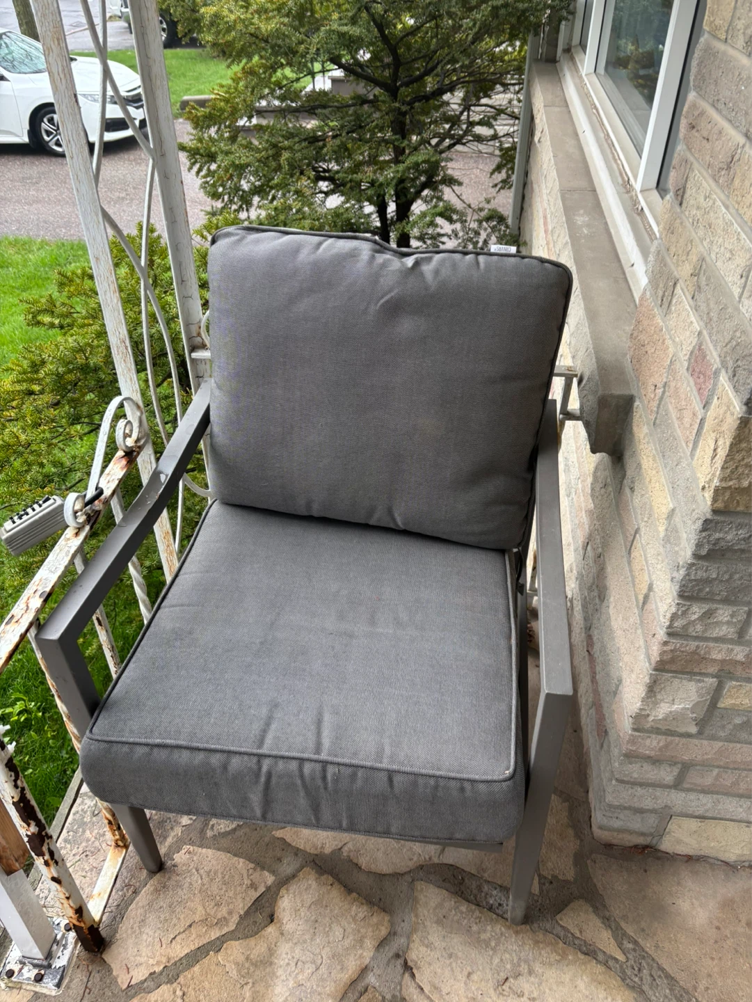 Outdoor patio chairs X2 with grey cushions and table