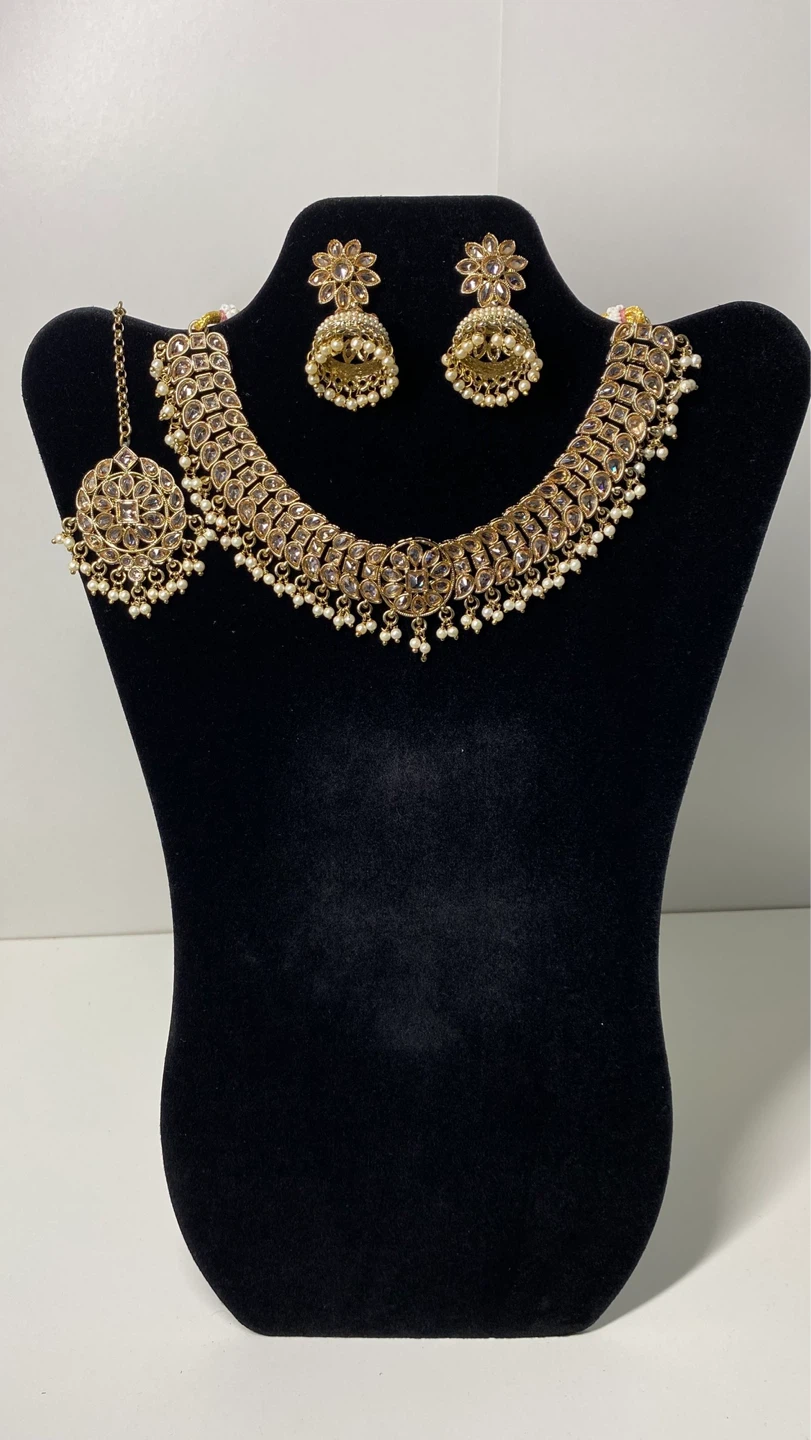 Gold-toned Kundan Necklace Set with Earrings and Tikka