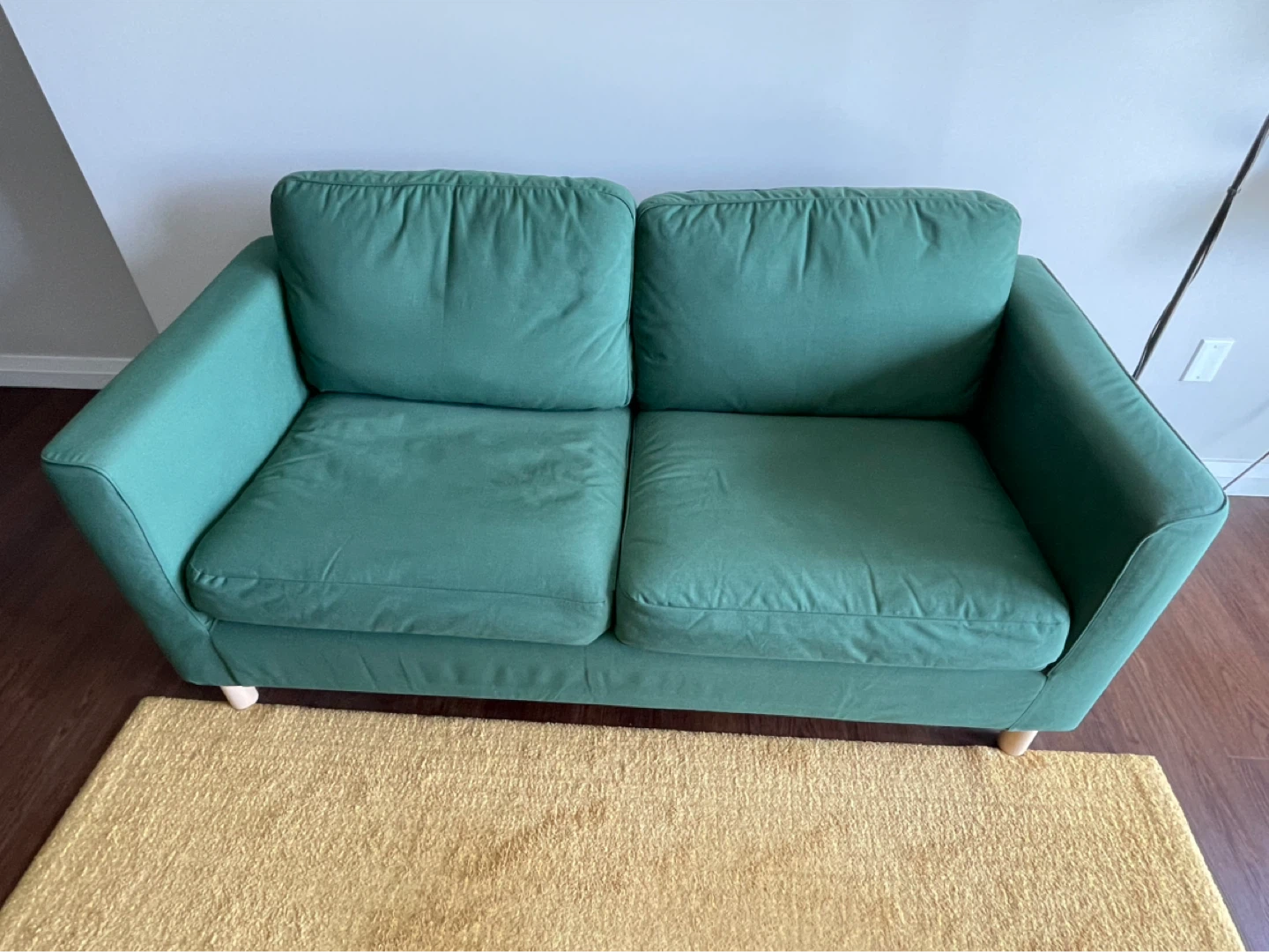 Green Two-Seater Sofa
