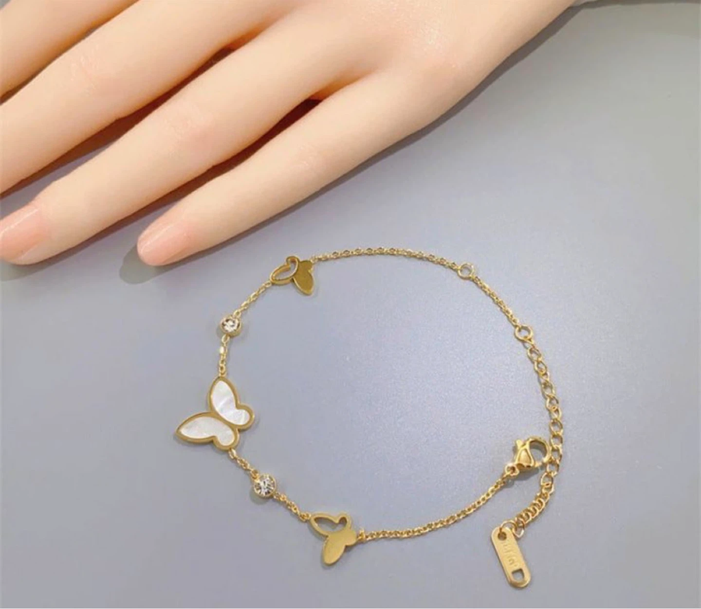 Gold plated tone butterfly bracelet with crystals