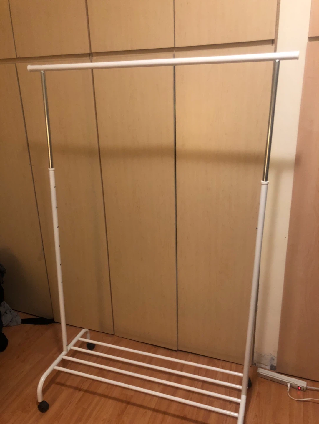 White Rolling Clothes Rack with Shelf
