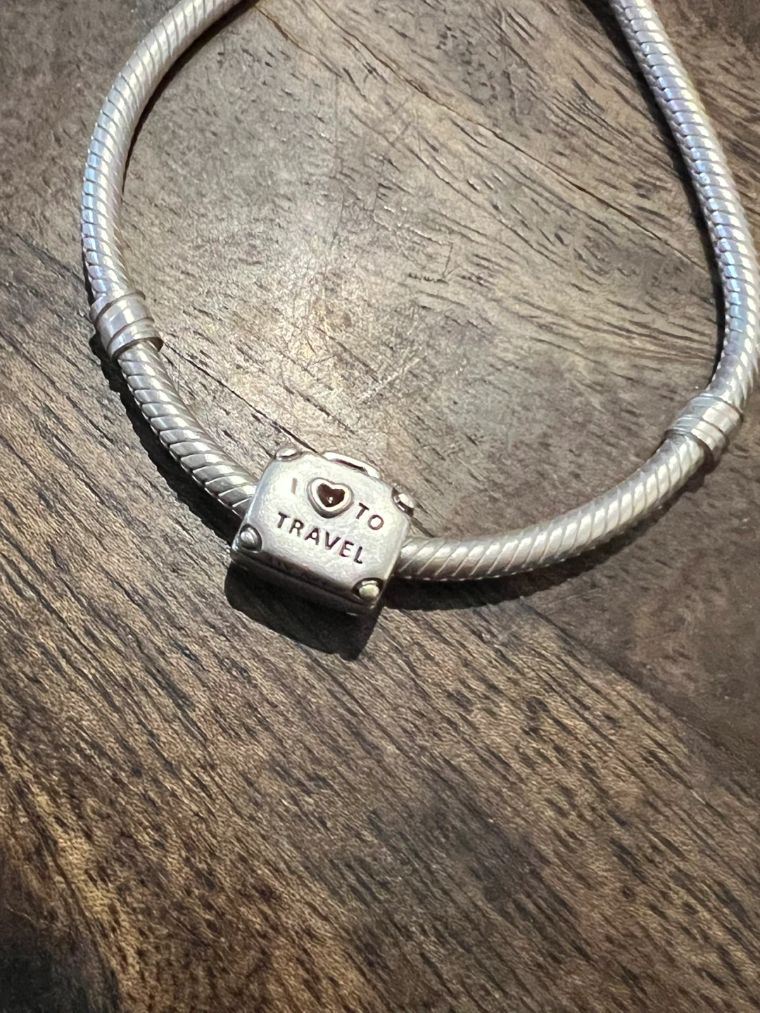 Retired Pandora "I Love To Travel" silver Charm