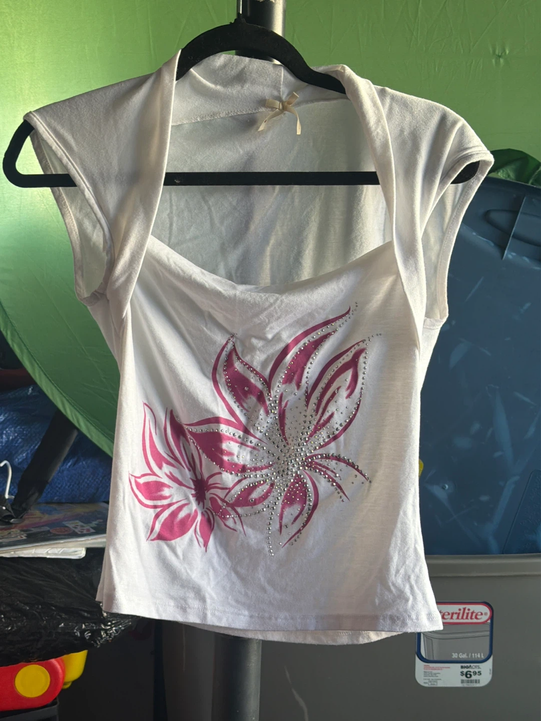 White halter neck top with pink floral rhinestone design