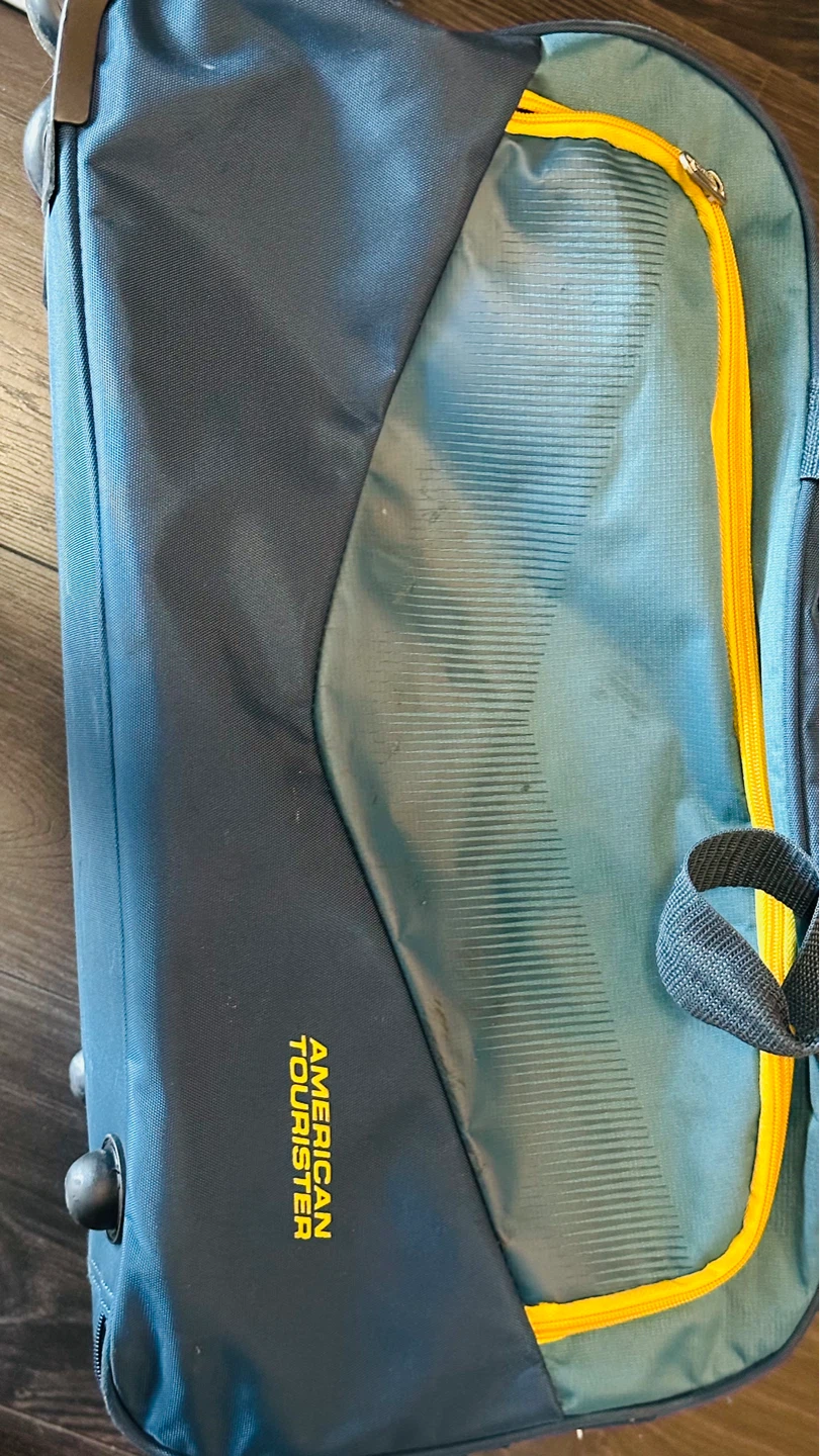 American Tourister Rolling Luggage Bag