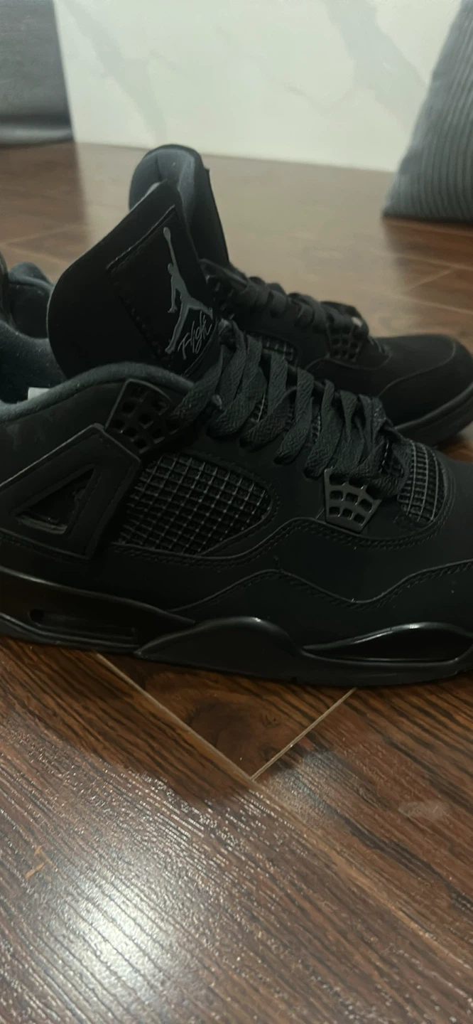 Black cat jordan 4’s - photo 4