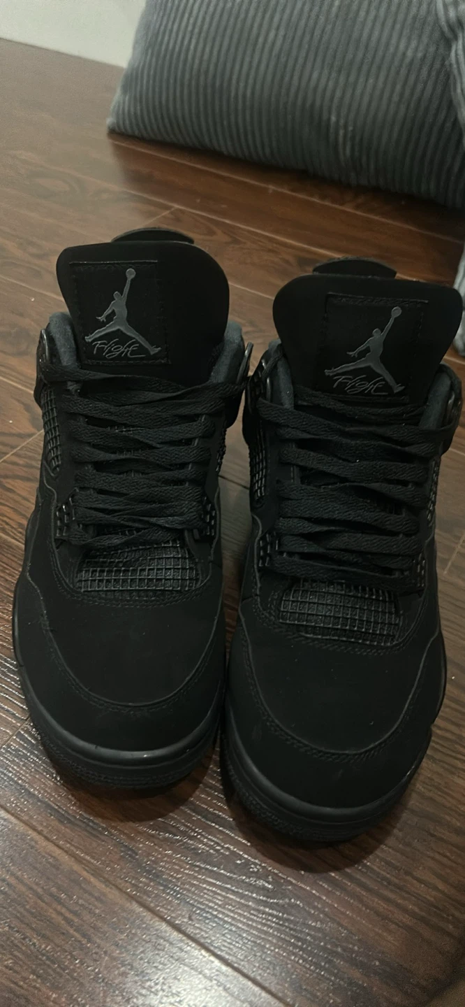 Black cat jordan 4’s