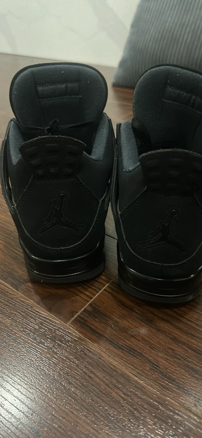 Black cat jordan 4’s - photo 3