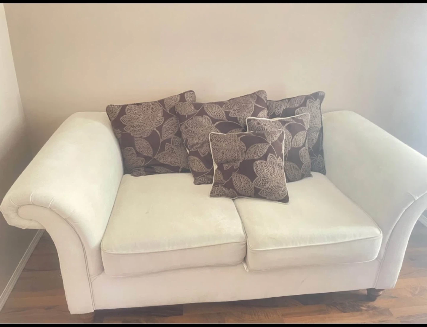 2 piece Cream Loveseat and sofa with Decorative Pillows