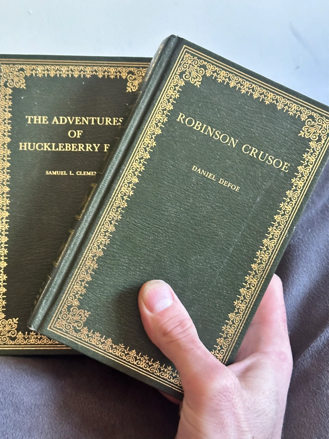 Robinson Crusoe ,huckleberry Finn Samual L.Clemens