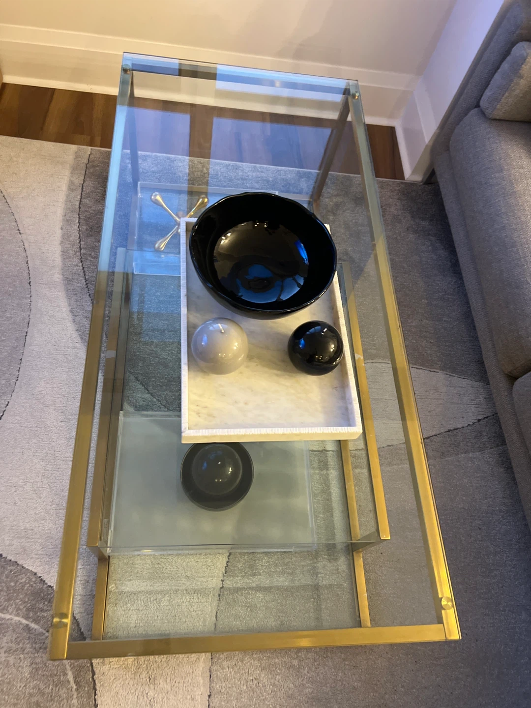 Gold & Glass Coffee Table with Decorative Accents