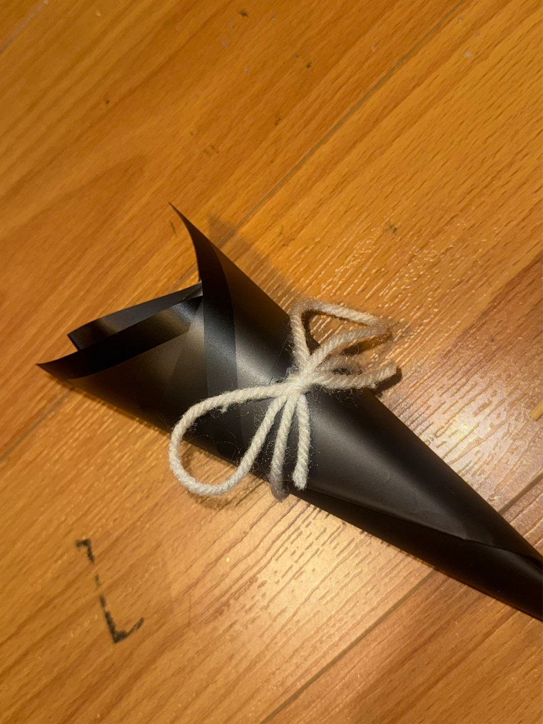 White Ribbon Rose in Black Cone
