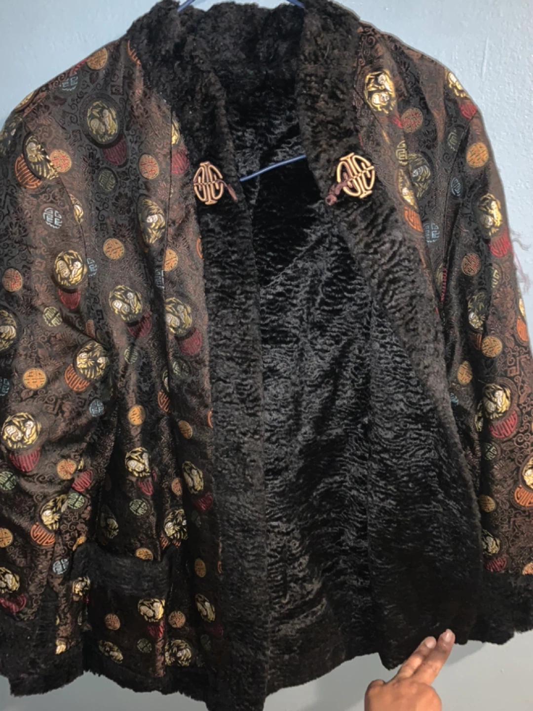 Asian-inspired brocade jacket with faux fur lining