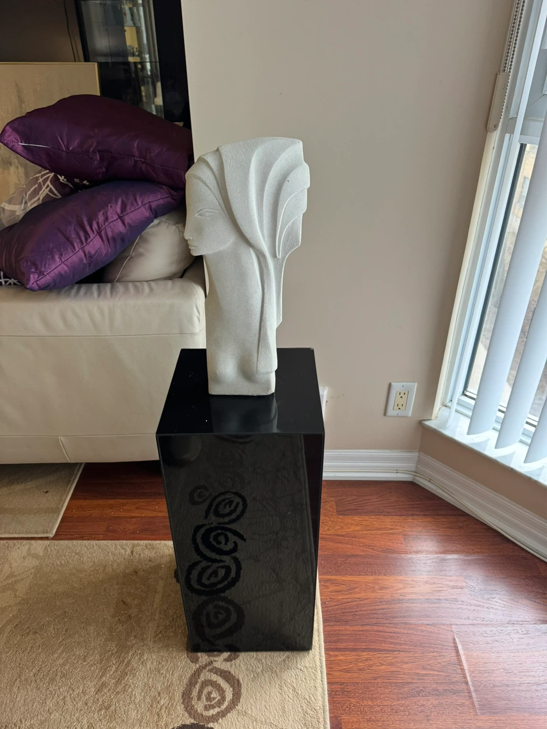 White Abstract Sculpture with Black Pedestal