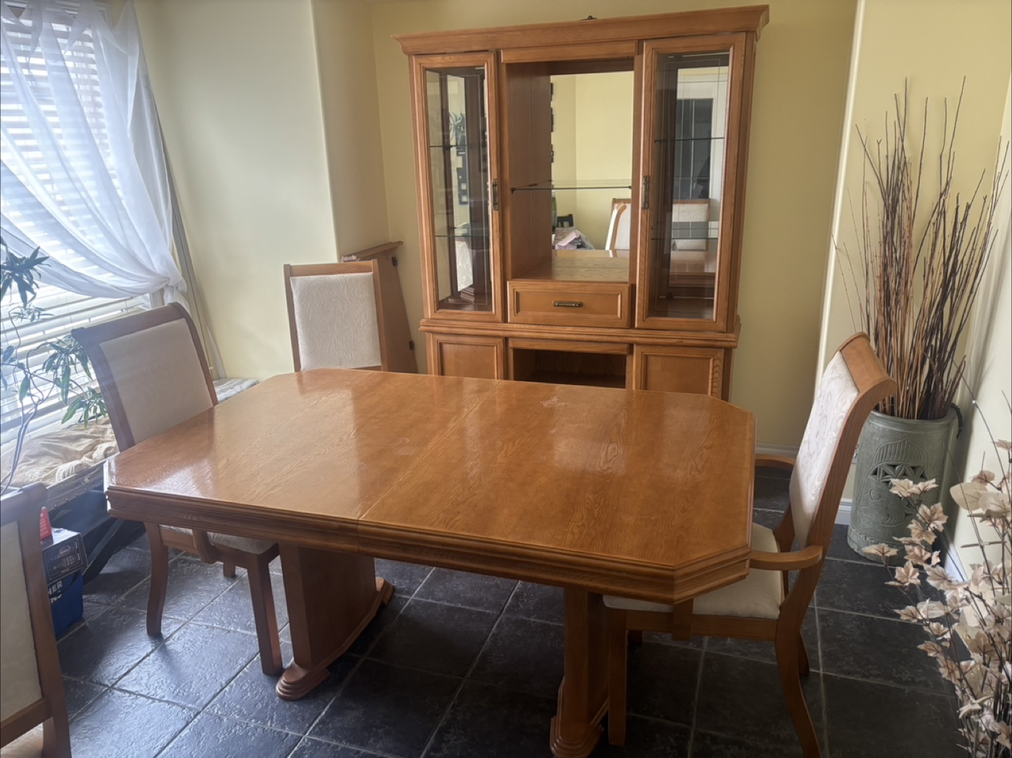 Dining table, chairs and glass cabinet