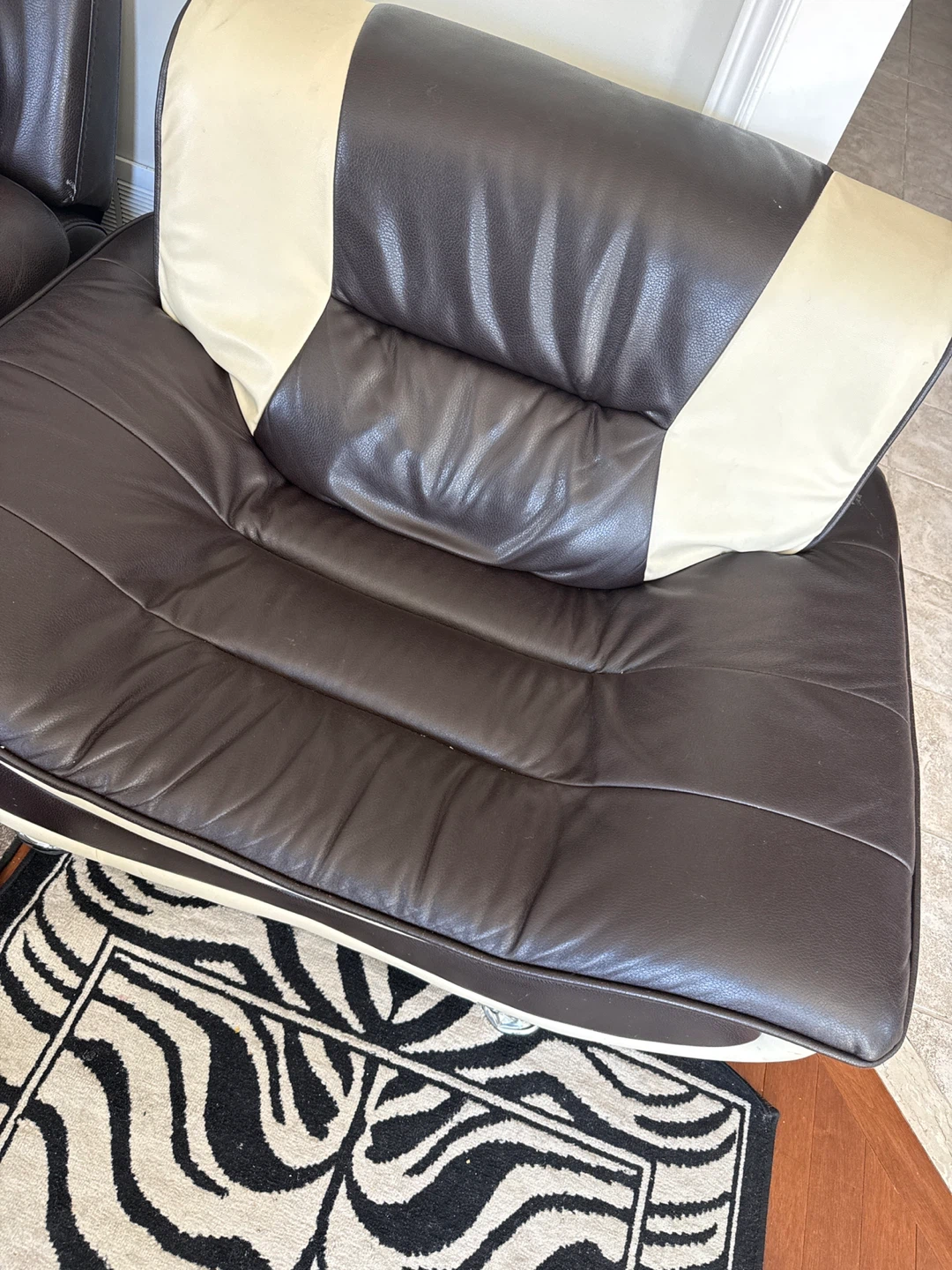 Brown and beige faux leather loveseat - photo 2