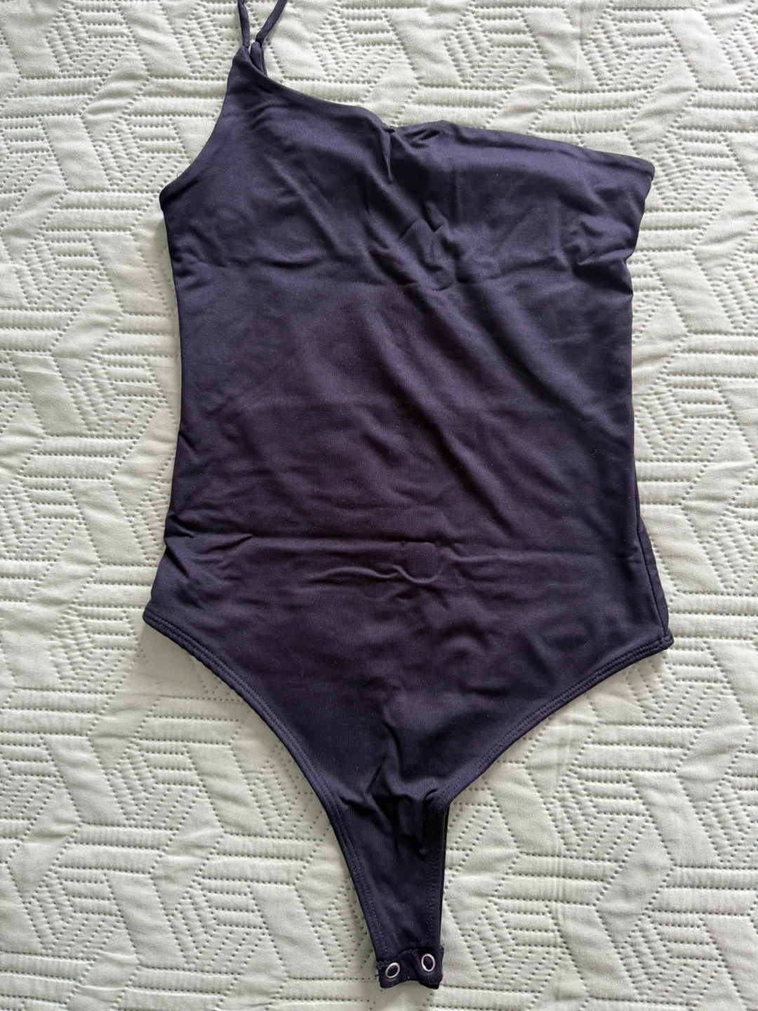 Black one-shoulder thong bodysuit