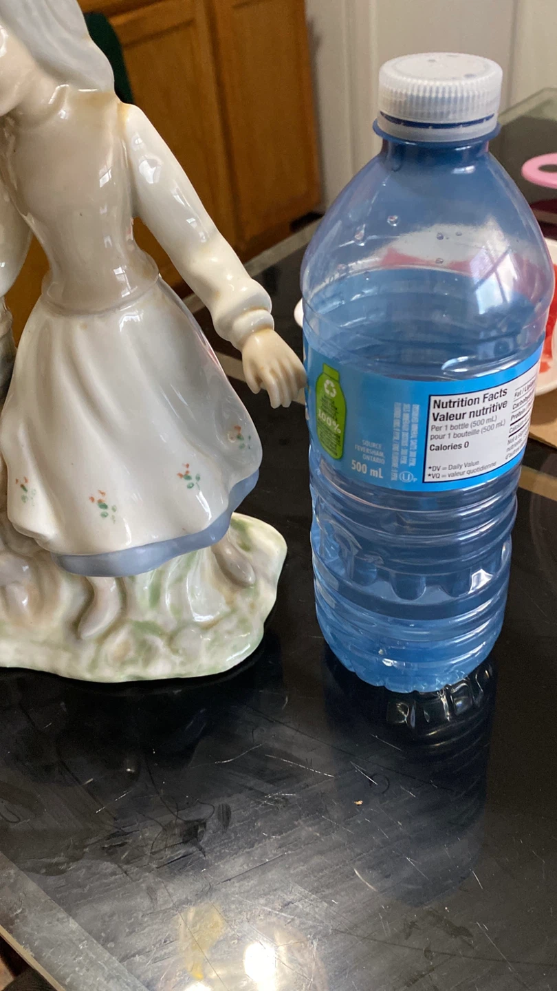 Tengra porcelain figurine of a girl at a well
