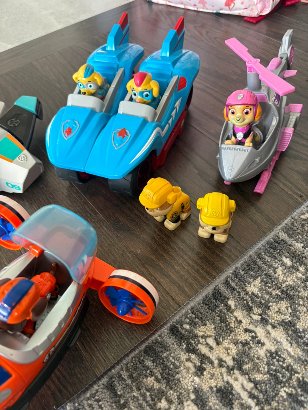 Various Paw Patrol Toy Vehicles and Figures