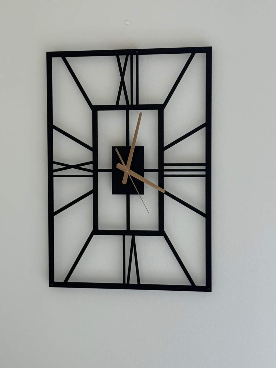 Black Metal Roman Numeral Wall Clock