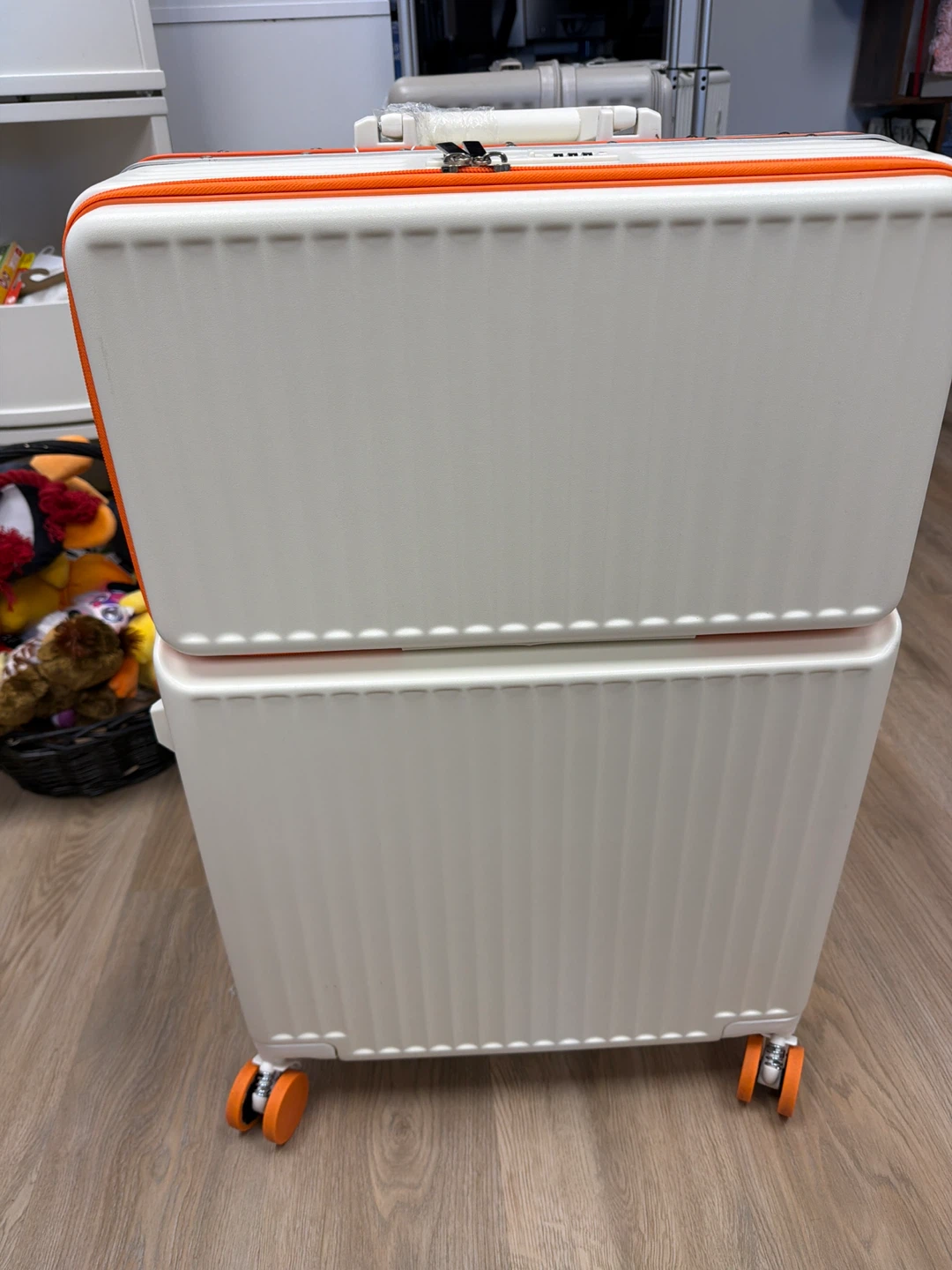 White and Orange Suitcase 28”