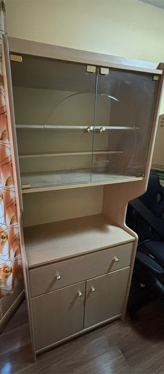 Wooden display cabinet with glass doors and shelves