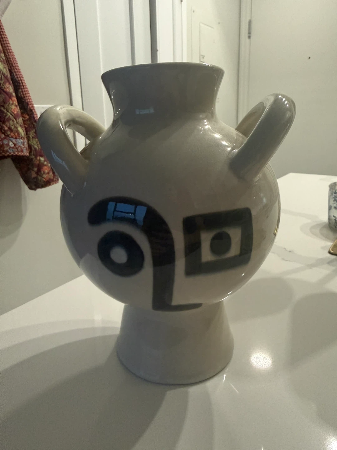 Ceramic Vase with Abstract Face Design