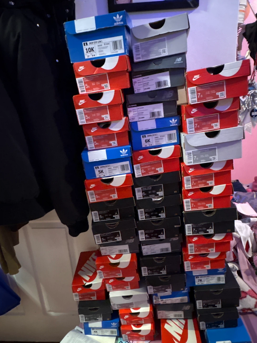 Assorted Nike, Adidas, and New Balance Shoe Boxes