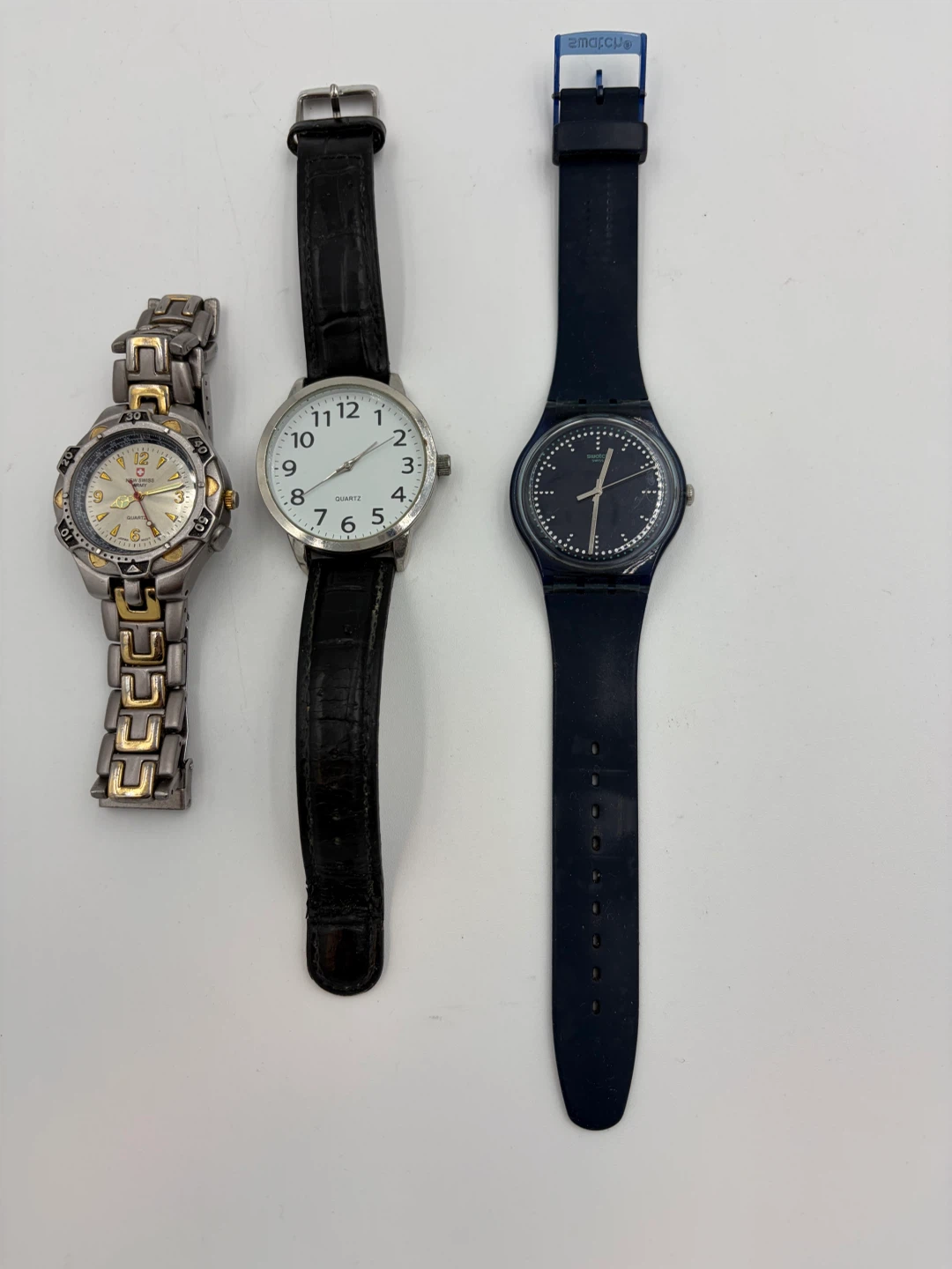 Three Assorted Wristwatches Quartz, Swatch, Swiss Army