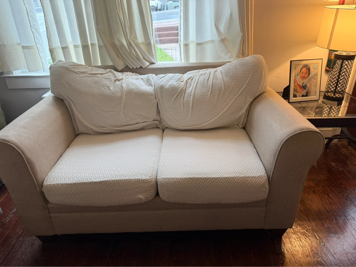 Cream Loveseat Sofa and a long sofa with Decorative Pillows