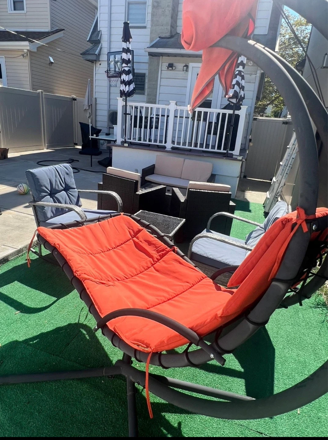 Outdoor Hanging Chaise Lounge Chair with Orange Cushion