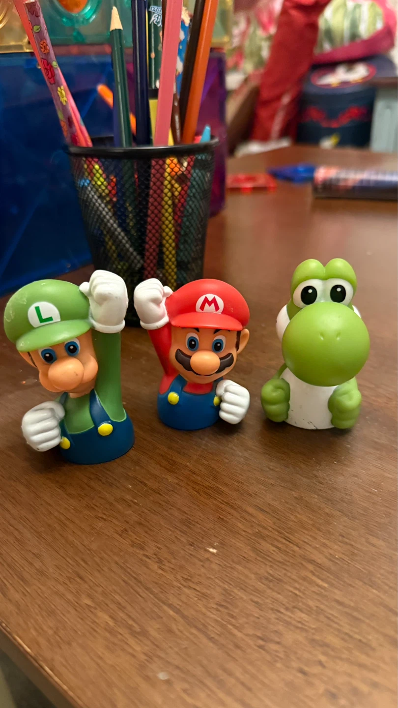 Nintendo Mario, Luigi, and Yoshi Figurines fingers