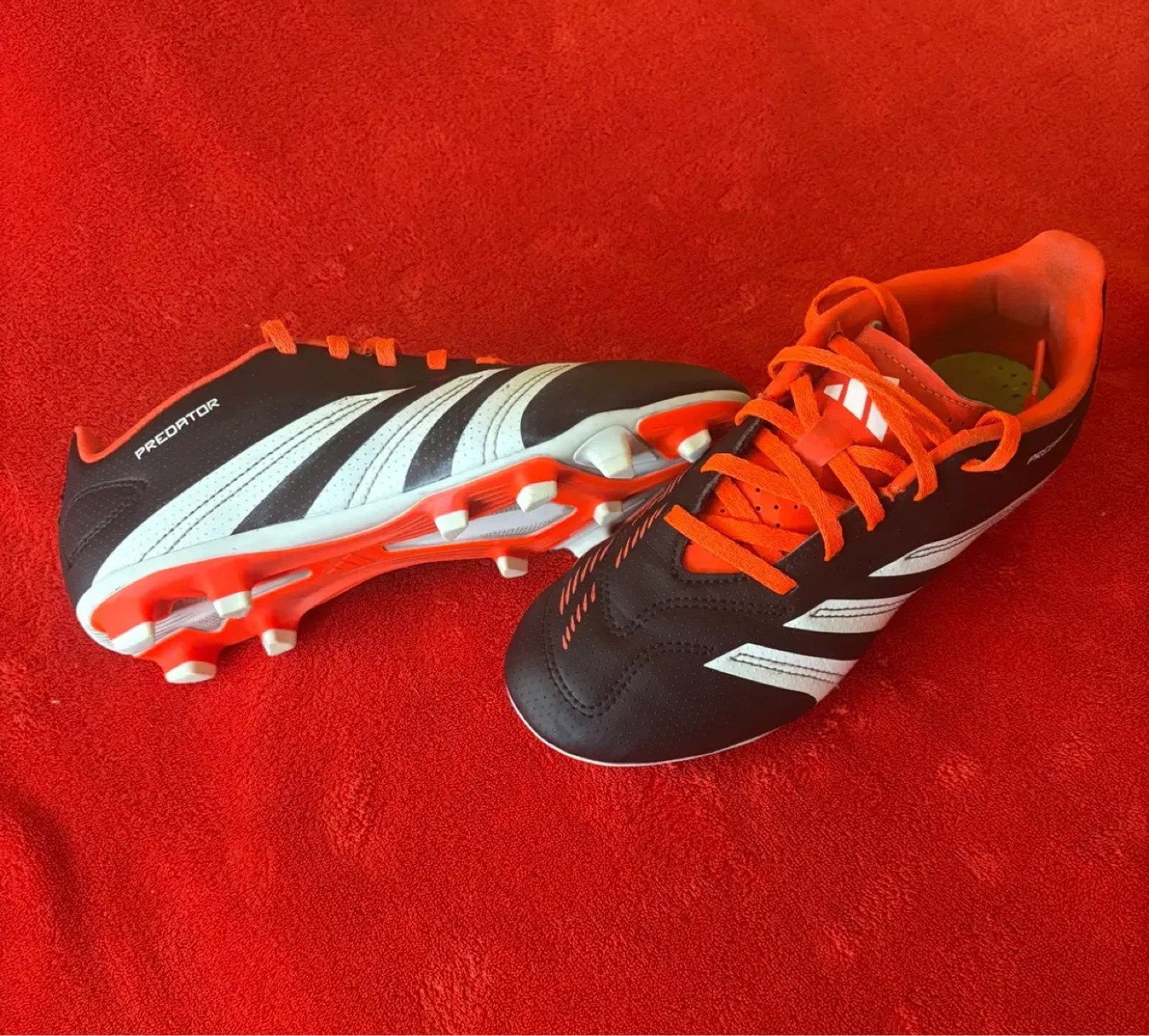 Kids soccer shoes.