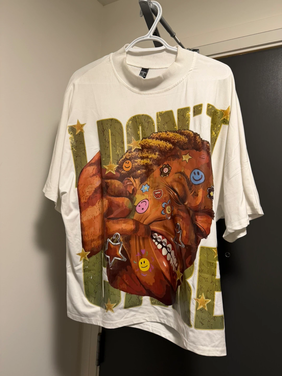 White T-Shirt with "I DON'T CARE" Graphic