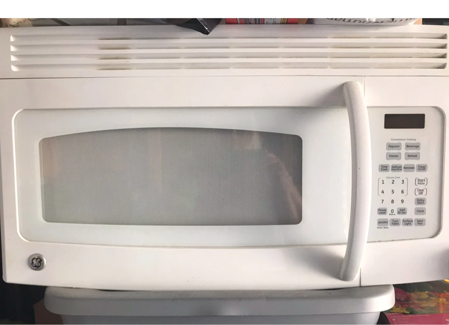GE Above the Cooktop Microwave Oven JVM1540