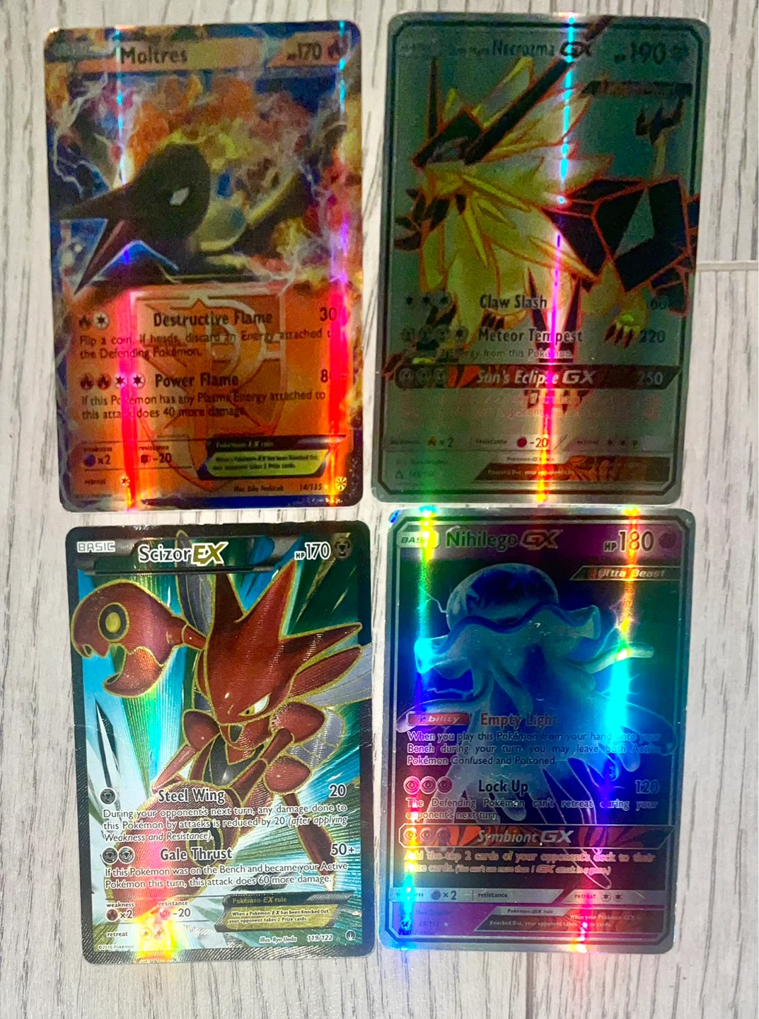 Scizor-EX, Dusk Mane Necrozma-GX, Moltres-EX, Nihilego-GX