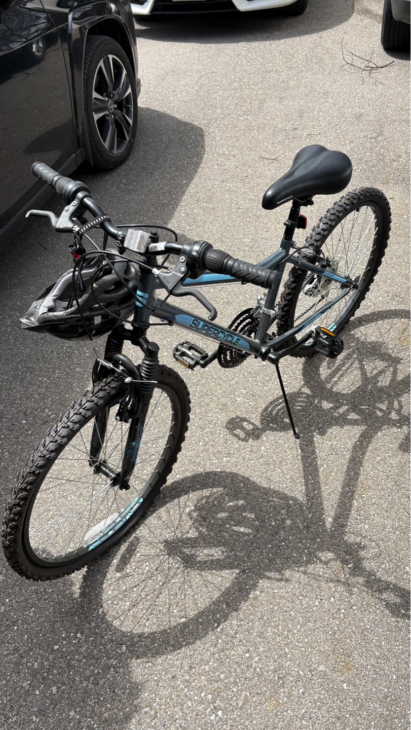 Like New Mountain Bike – NEVER Used + Helmet Included