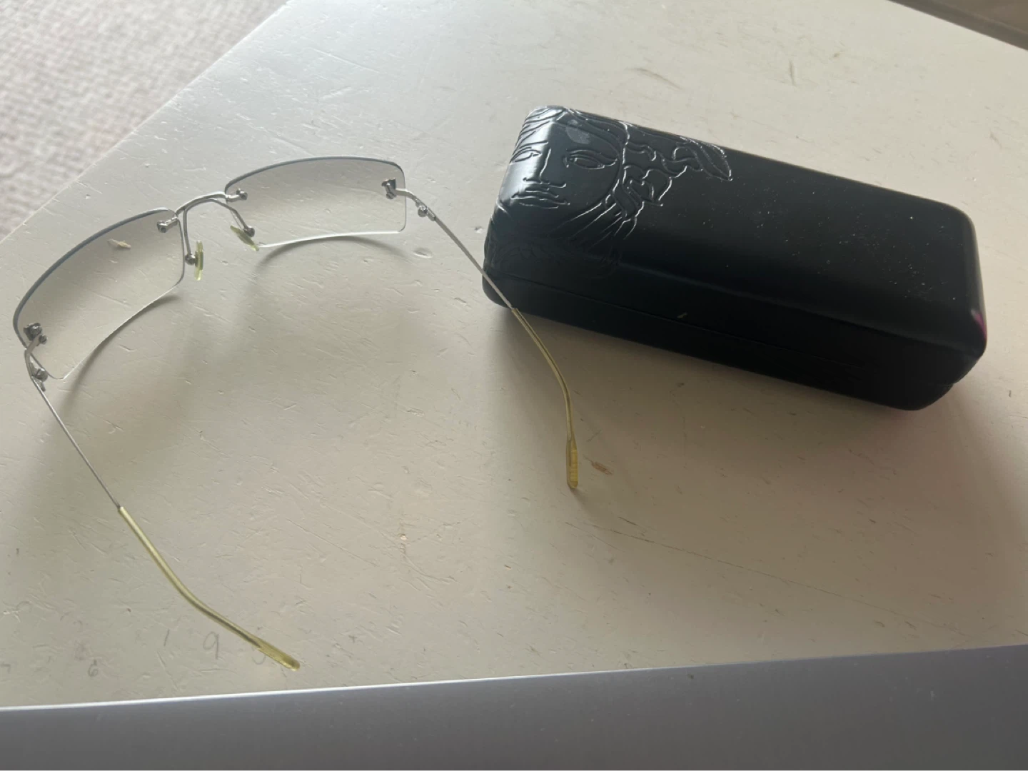 Vintage Versace Silver Medusa Rimless Grey