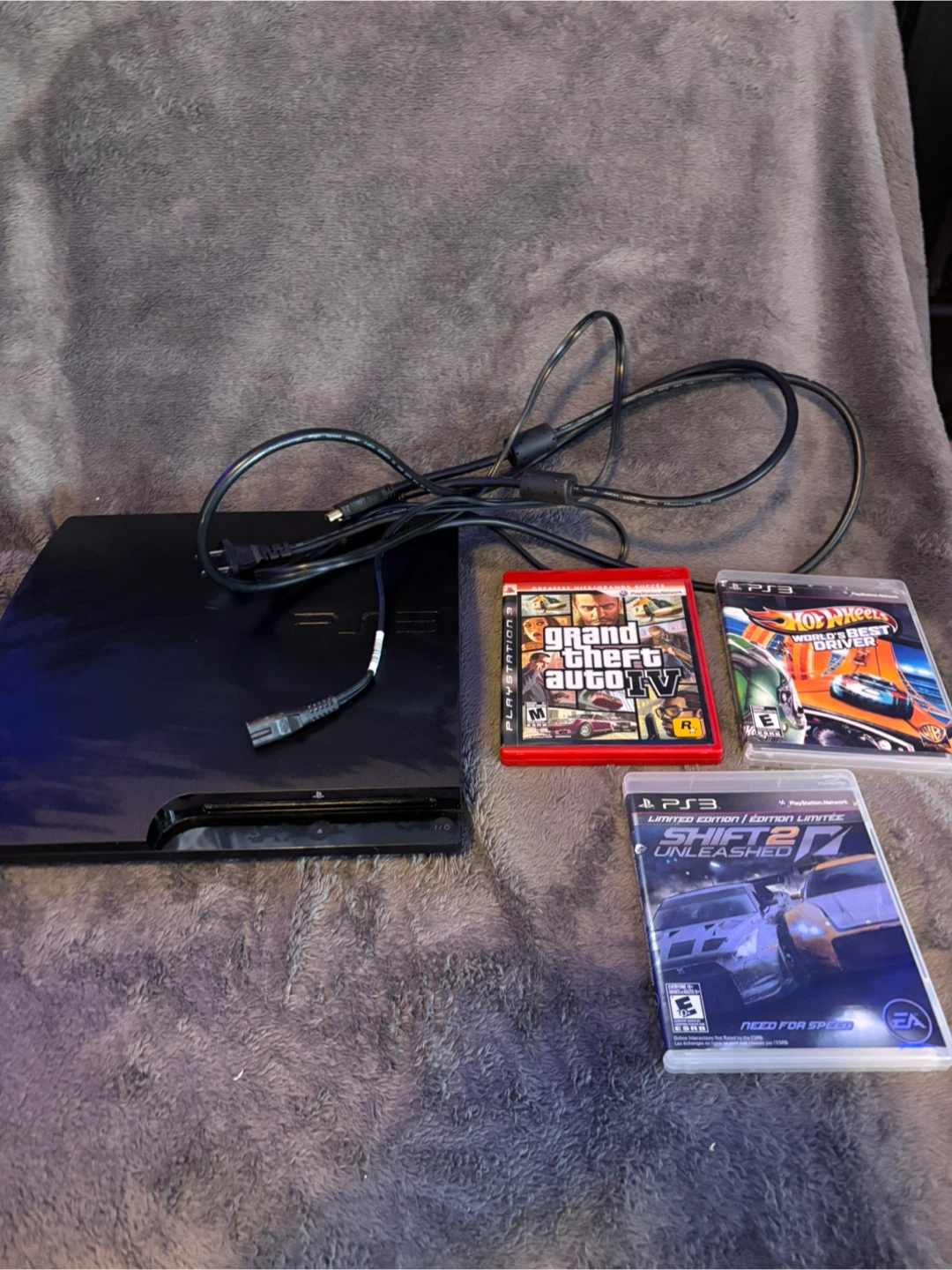 Sony PlayStation 3 with 3 Games