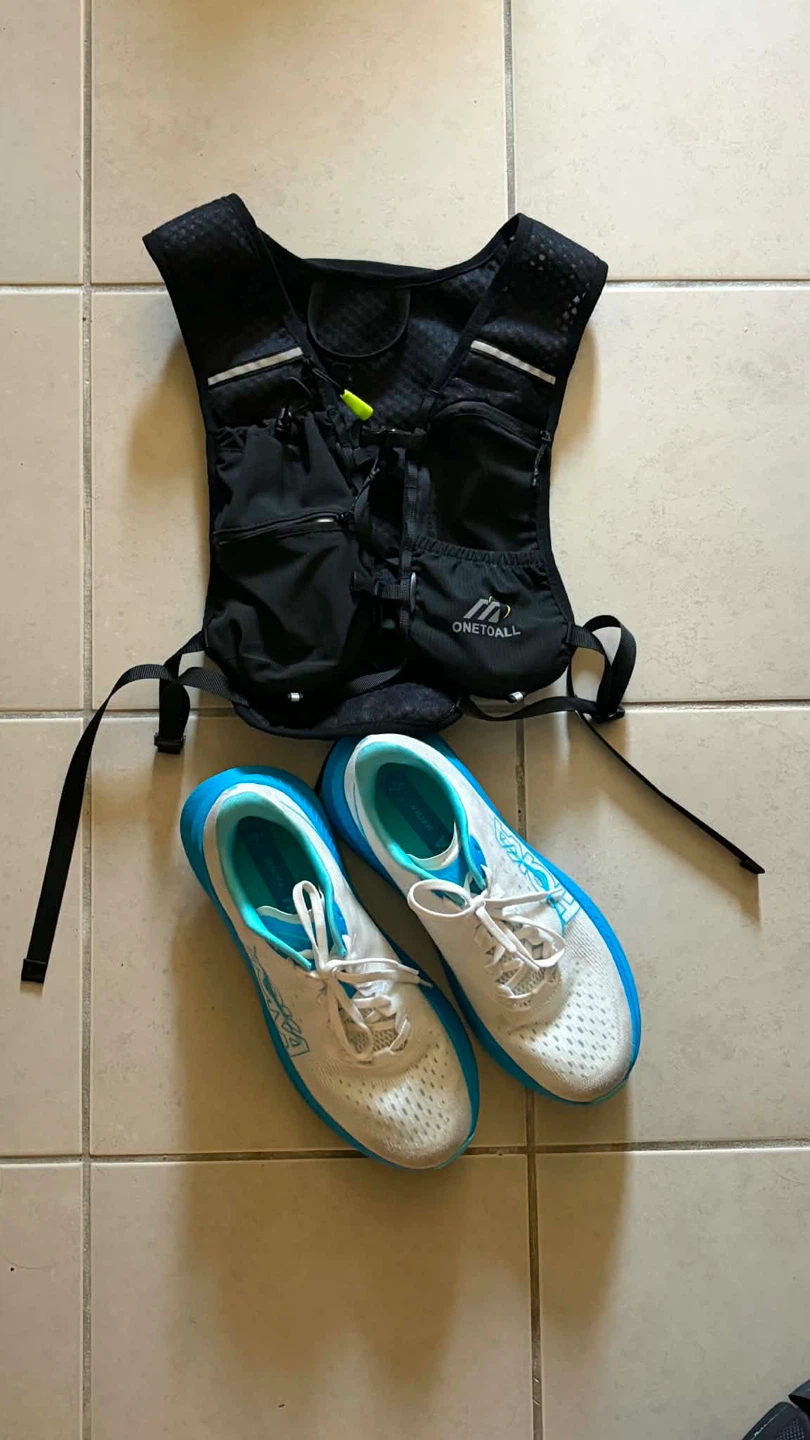 Hoka Running Shoes & ONETALL Hydration Vest