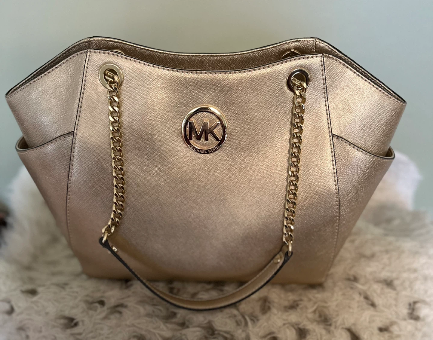MK gold hand bag